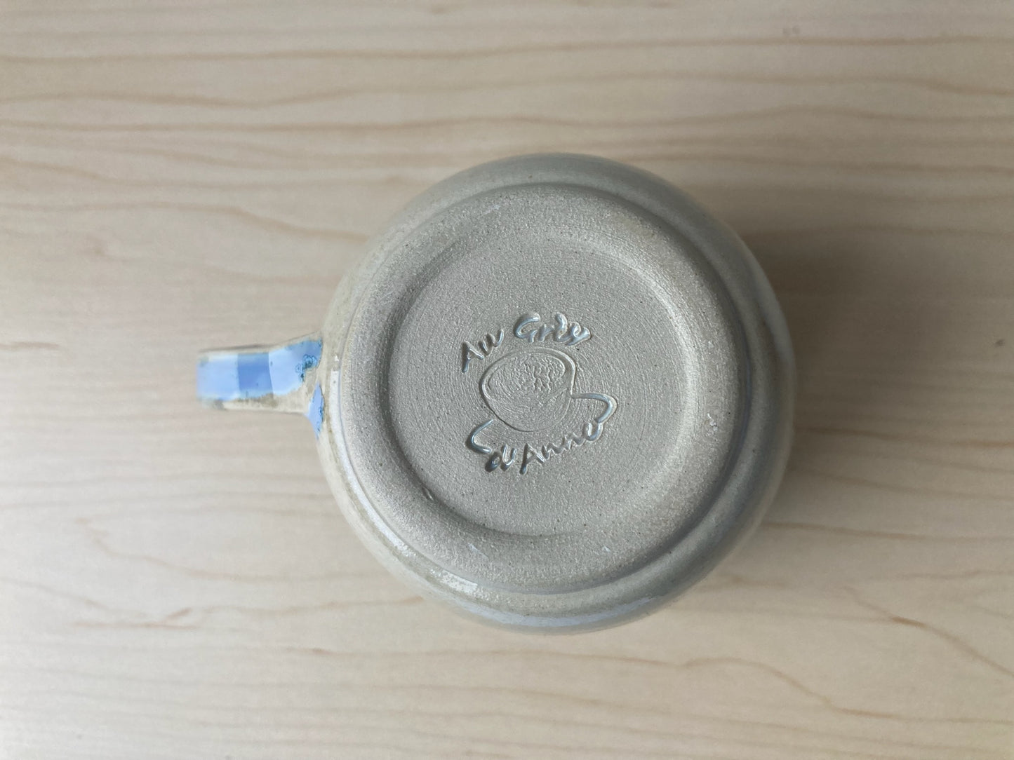 Mug beige, bleu et vert