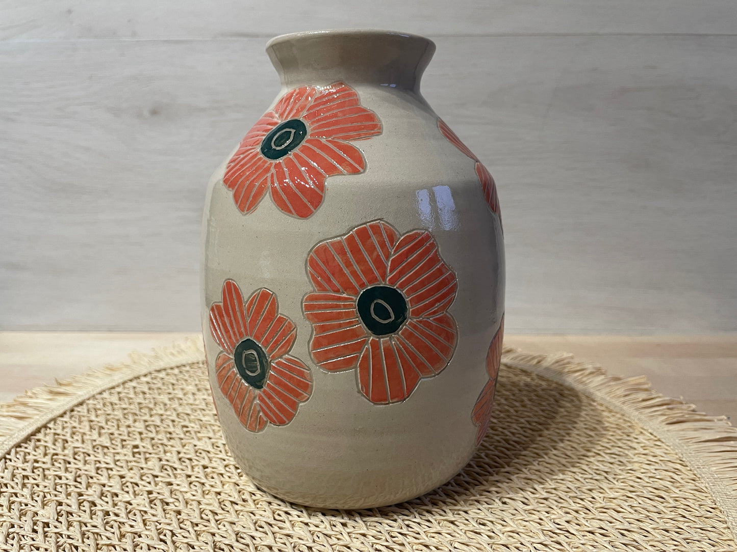 Vase fleurs orangées